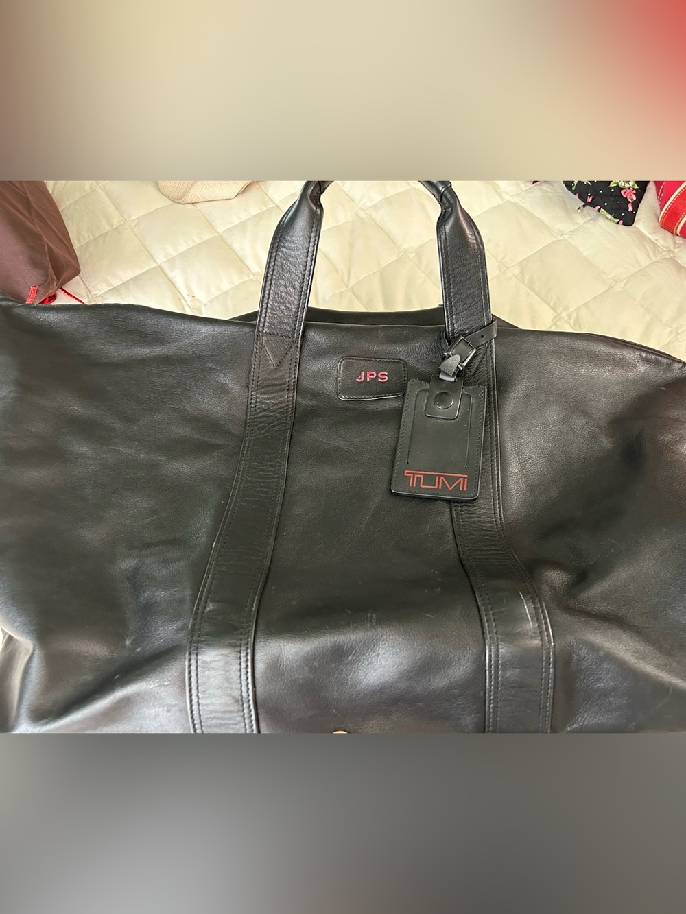 Tumi Black Leather Duffel with Red Logo Accents